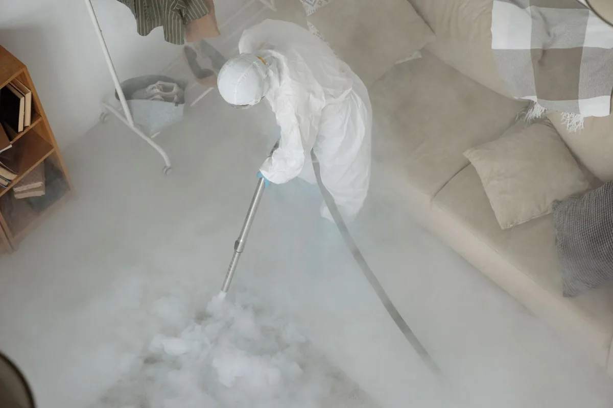 Biohazard cleanup technician in protective equipment, Blacksburg, VA